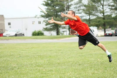 CEO of Beyond Booksmart, Michael Delman playing ultimate frisbee