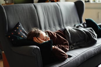 adria20-year old girl living at her parents' house and unemployed, lying on a couch watching TV