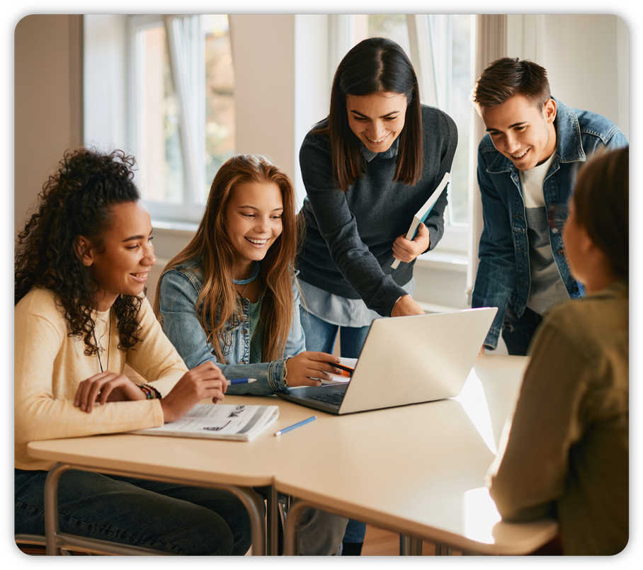 Group meeting with laptop and notebooks