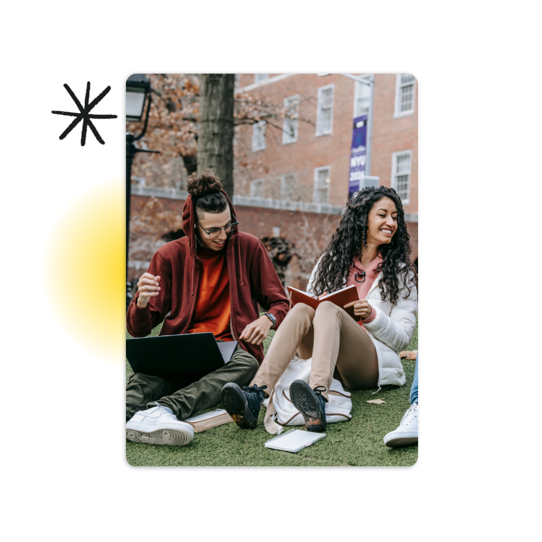 College students sitting in the grass