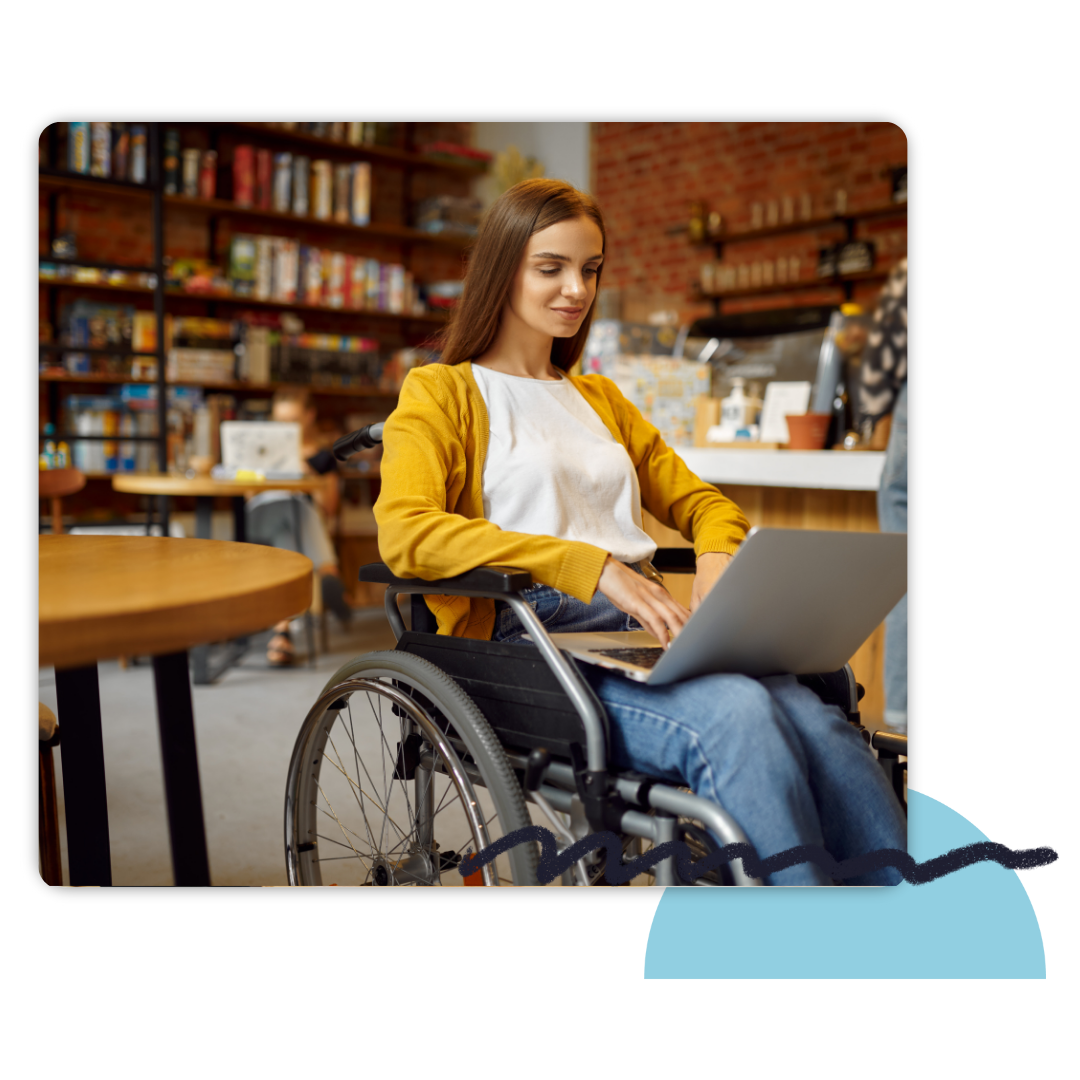 woman in wheel chair on computer